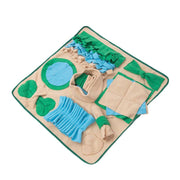 Dog foraging mat with various textures and compartments.
