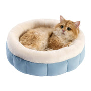 Warm round cat bed and puppy bed for year-round comfort.
