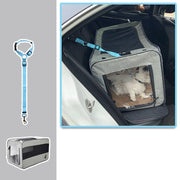 Portable folding pet carrier placed in a car backseat with a white dog inside, featuring mesh panels and safety tether.