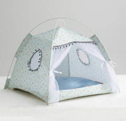 Light blue floral Enclosed Cat Tent Bed with sheer curtains and circular mesh windows, offering a breathable and elegant pet retreat.