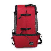 Red Double Shoulder Dog Carrier Backpack with black mesh and buckle closures. Durable and breathable for pet travel and outdoor use.