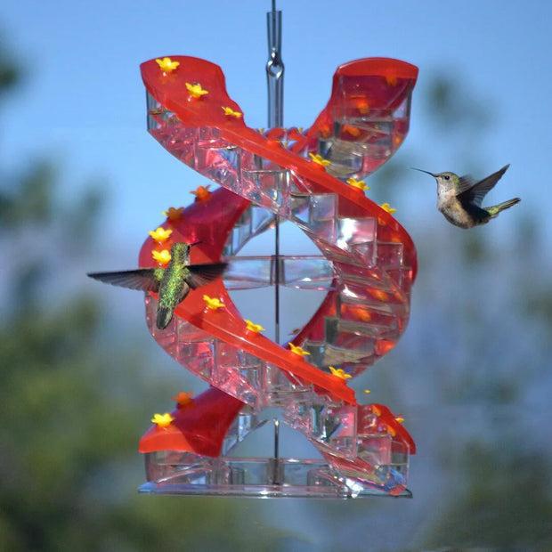 Spiral hummingbird feeder with orange climbing ladder design.
