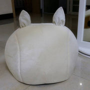 Soft cat bed resembling a cute animal character.
