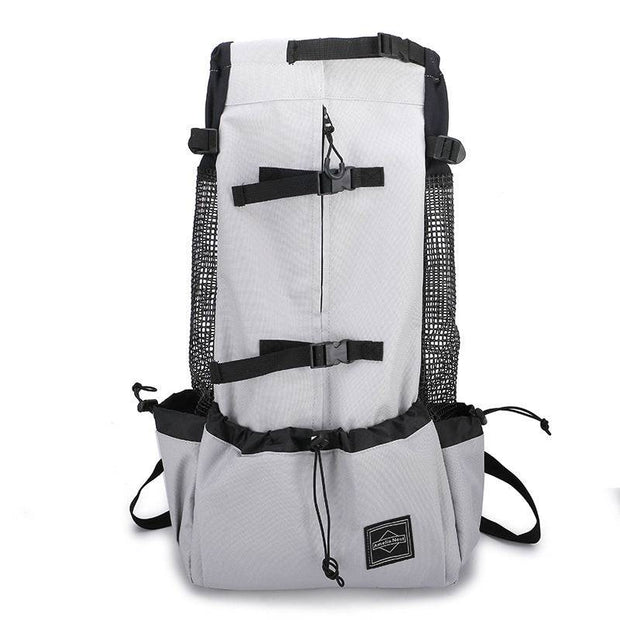Light gray Double Shoulder Dog Carrier Backpack with black mesh sides and secure buckles. Ideal for small to medium pets during travel.